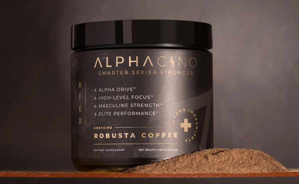 A jar of Alphacino robusta mushroom coffee on a dark shelf beside a mound of the coffee powder